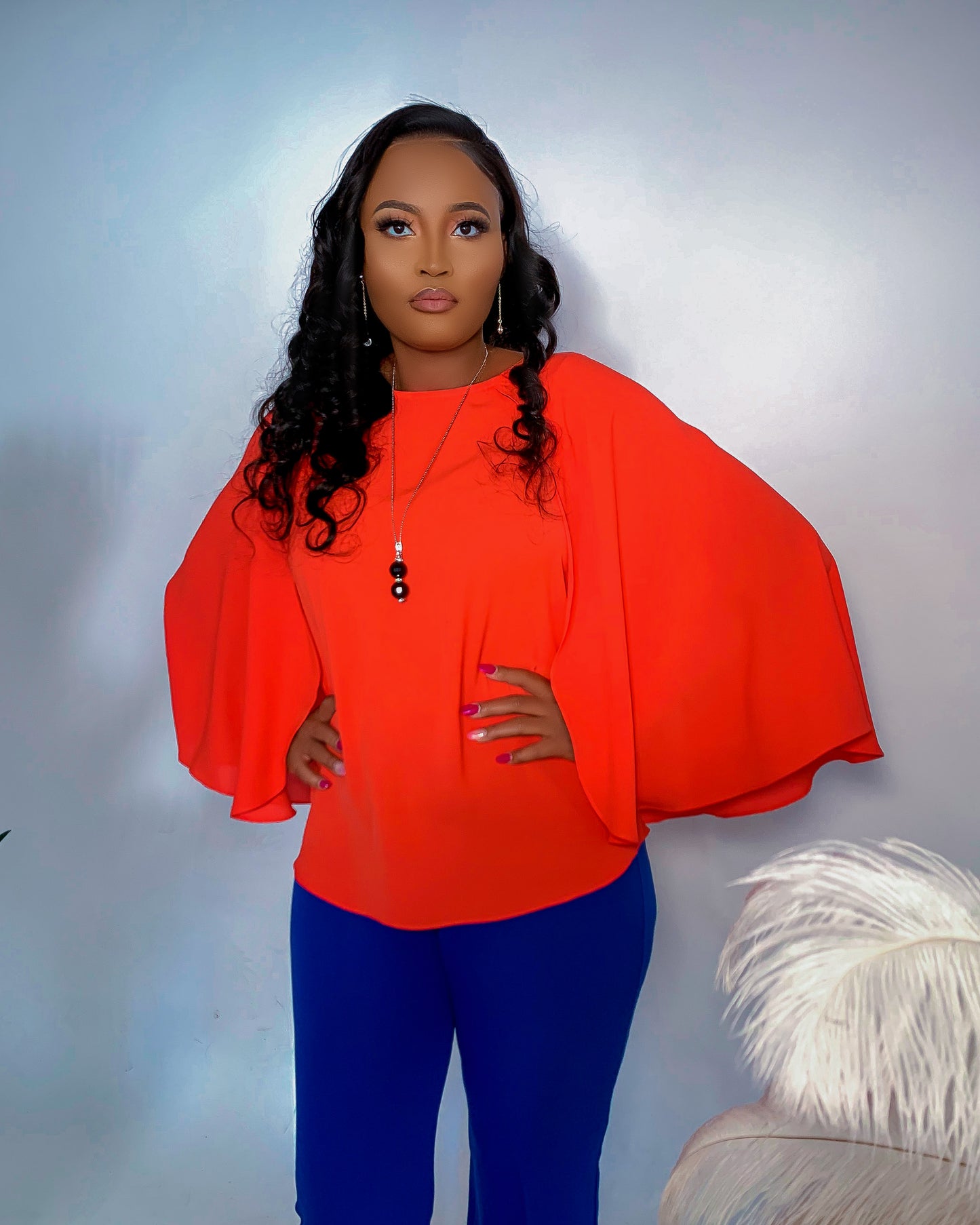 Women's Orange Top with Blue Pants